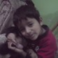 Con Sergio mi hijo menor, apapachandola, es la engreida de la casa