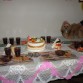 la mesa..y Puppy provocandose de los dulces