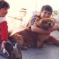 Mi hermana y yo con Pilín cuando era cachorro.